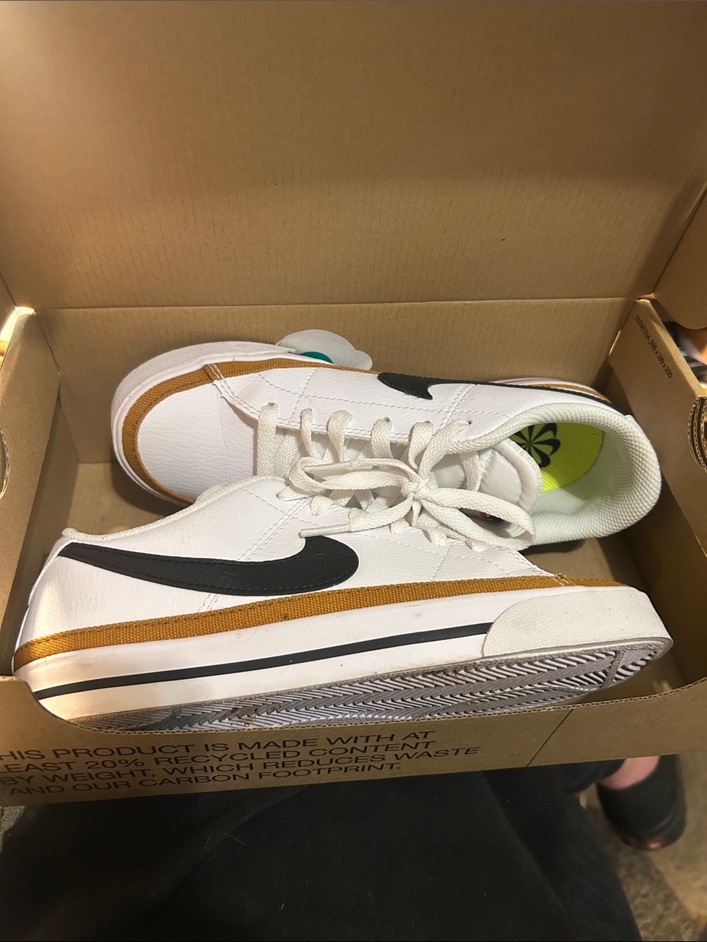 Nike Kids White Sneakers with Black Swoosh and Tan Stripe